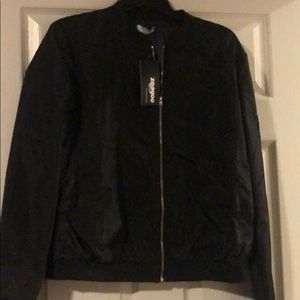 Black windbreaker
